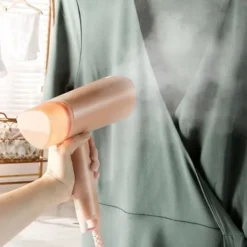 DOMO Strykjärn-Ångstryka - - DO7058S - 1300 W - 20 g/min - 100 ml - Korall